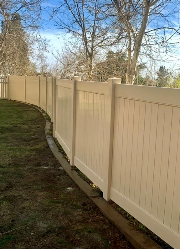 Beautiful newly installed vinyl fence