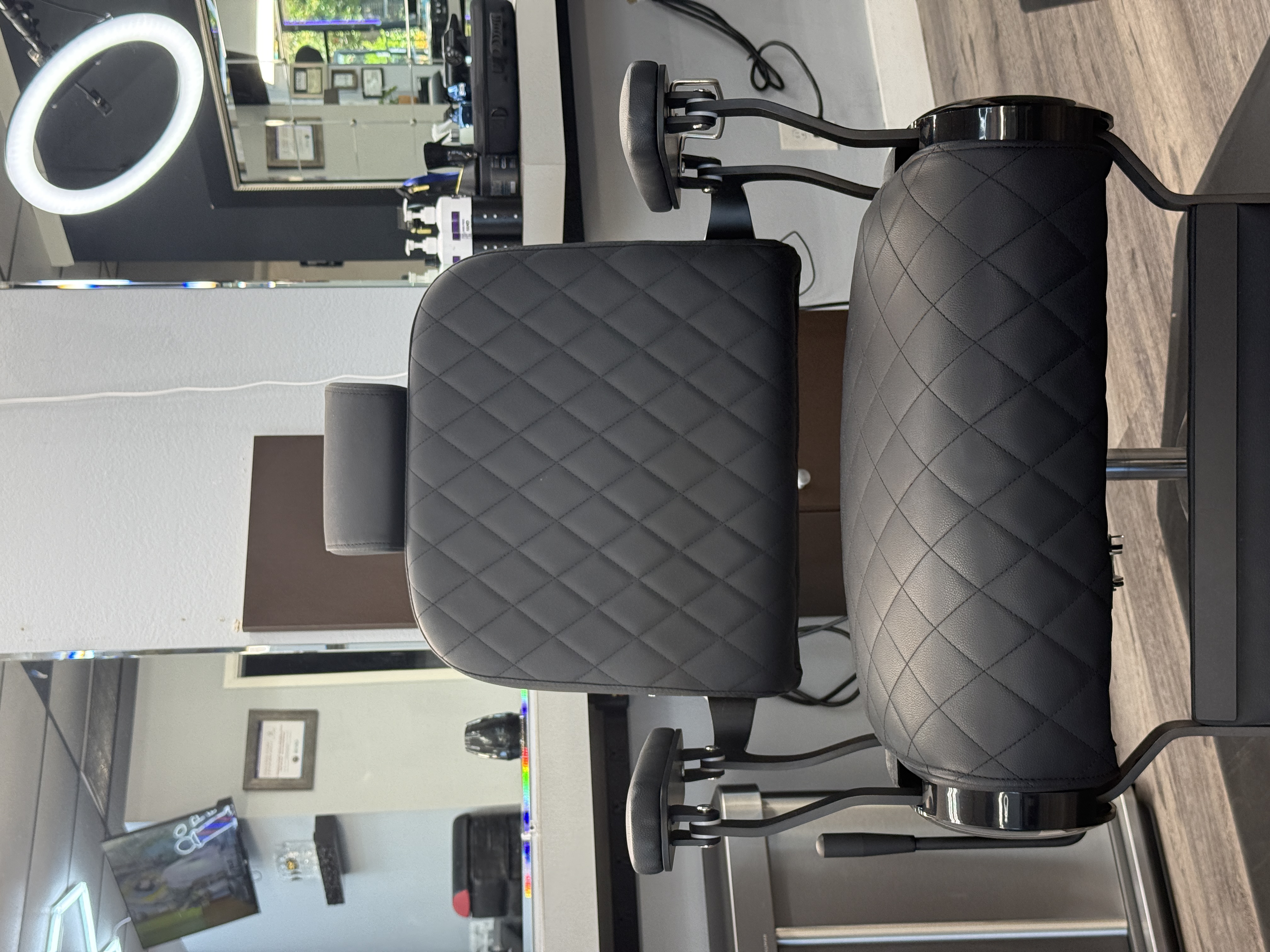Gualo Barbershop interior featuring a luxury classic barber chair and grooming station in Azusa, CA