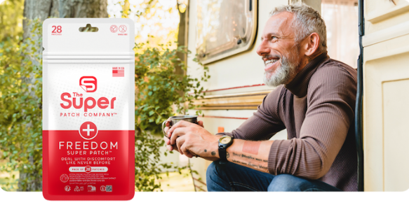 Older man smiling outside