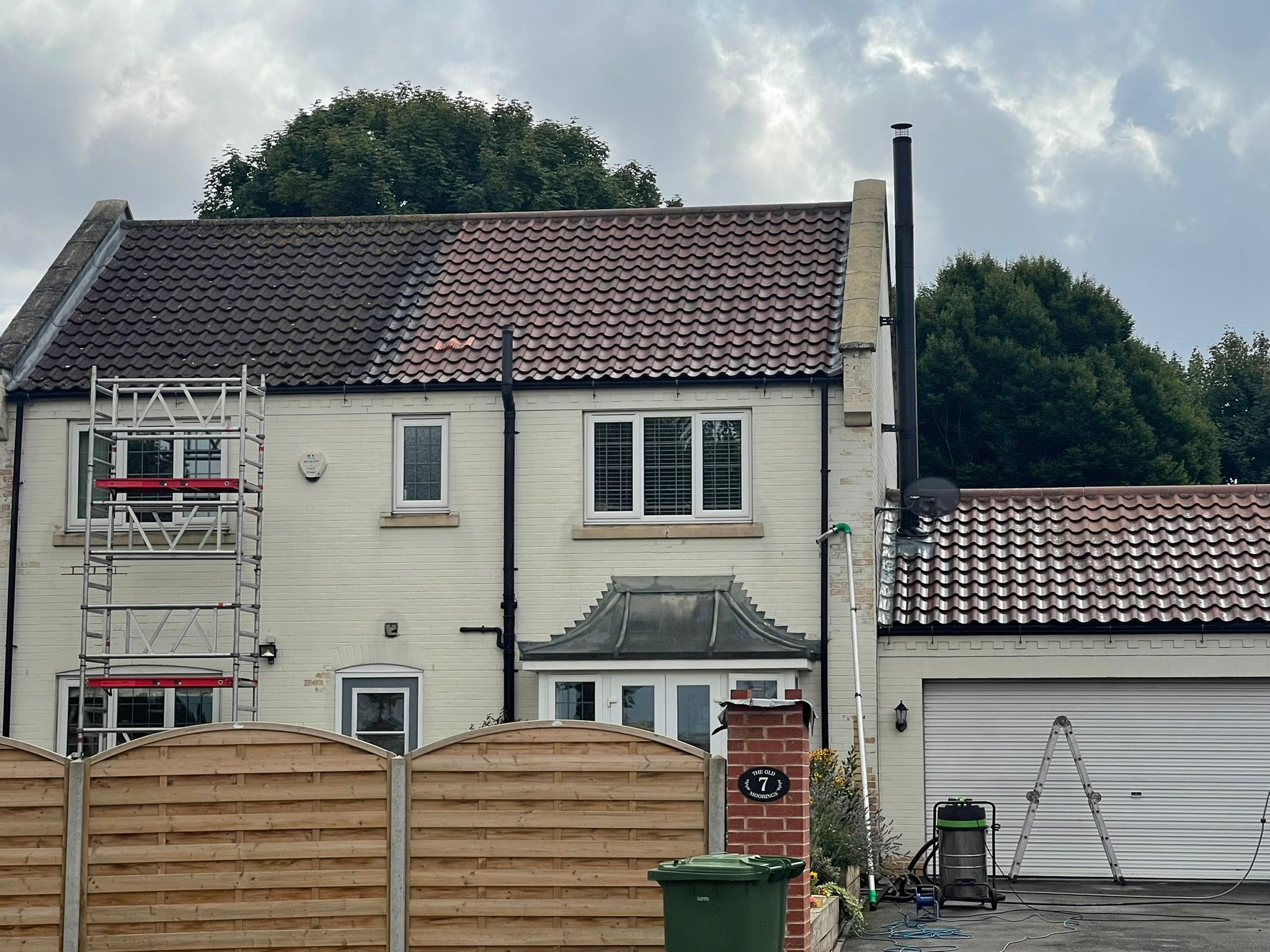 Before and after roof tile cleaning
