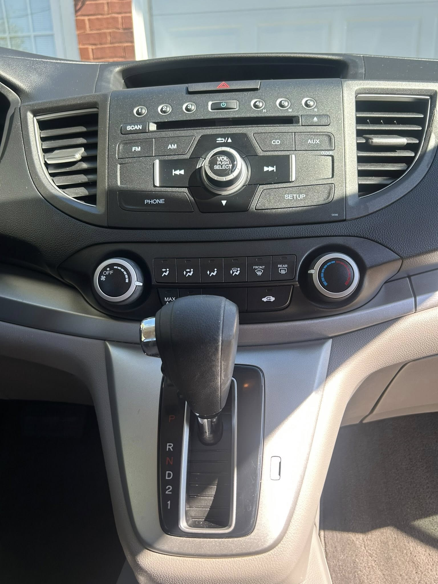 Cleaned car dashboard and center console after interior detailing