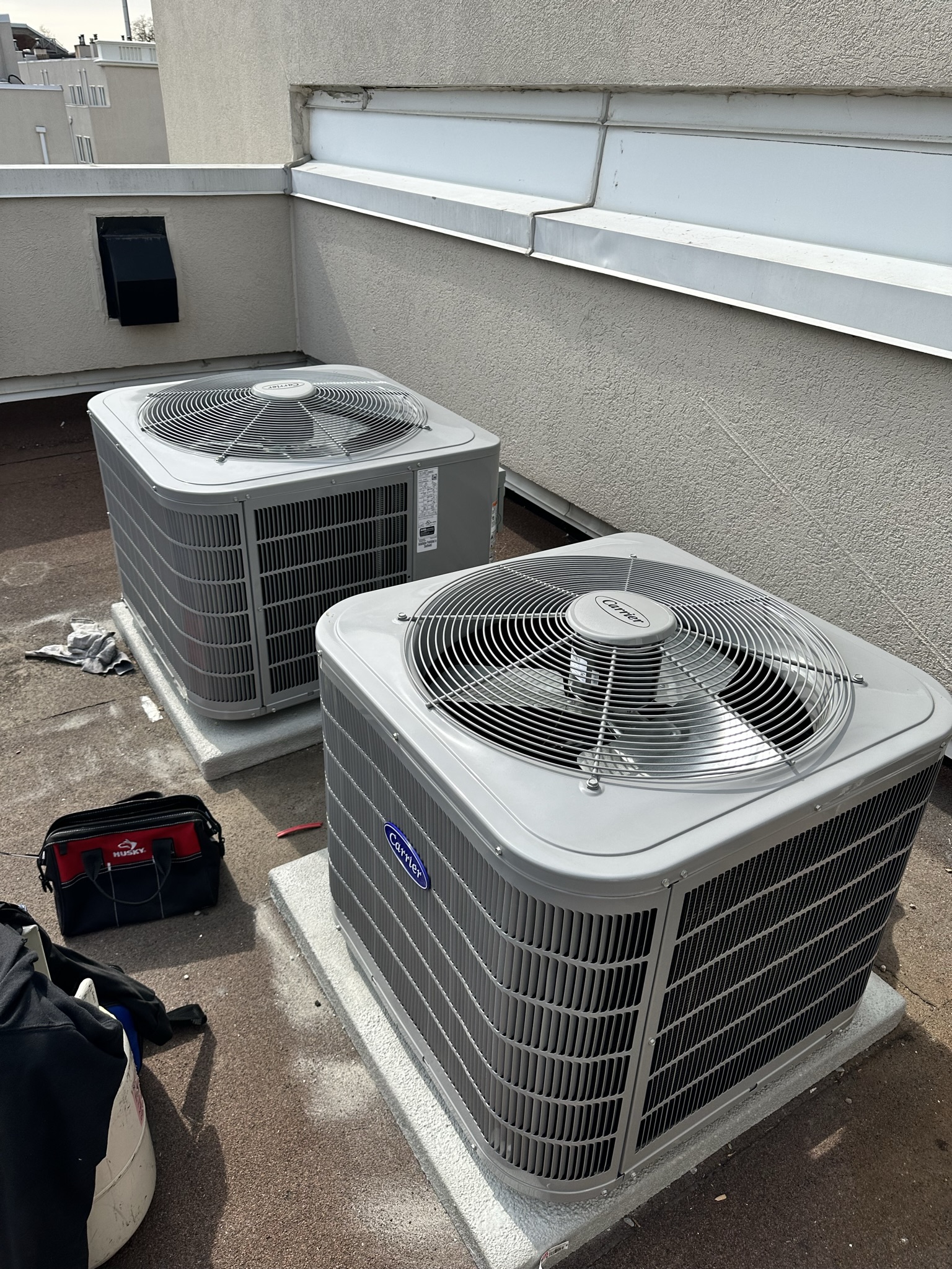 Dual Carrier AC condenser units installed on rooftop
