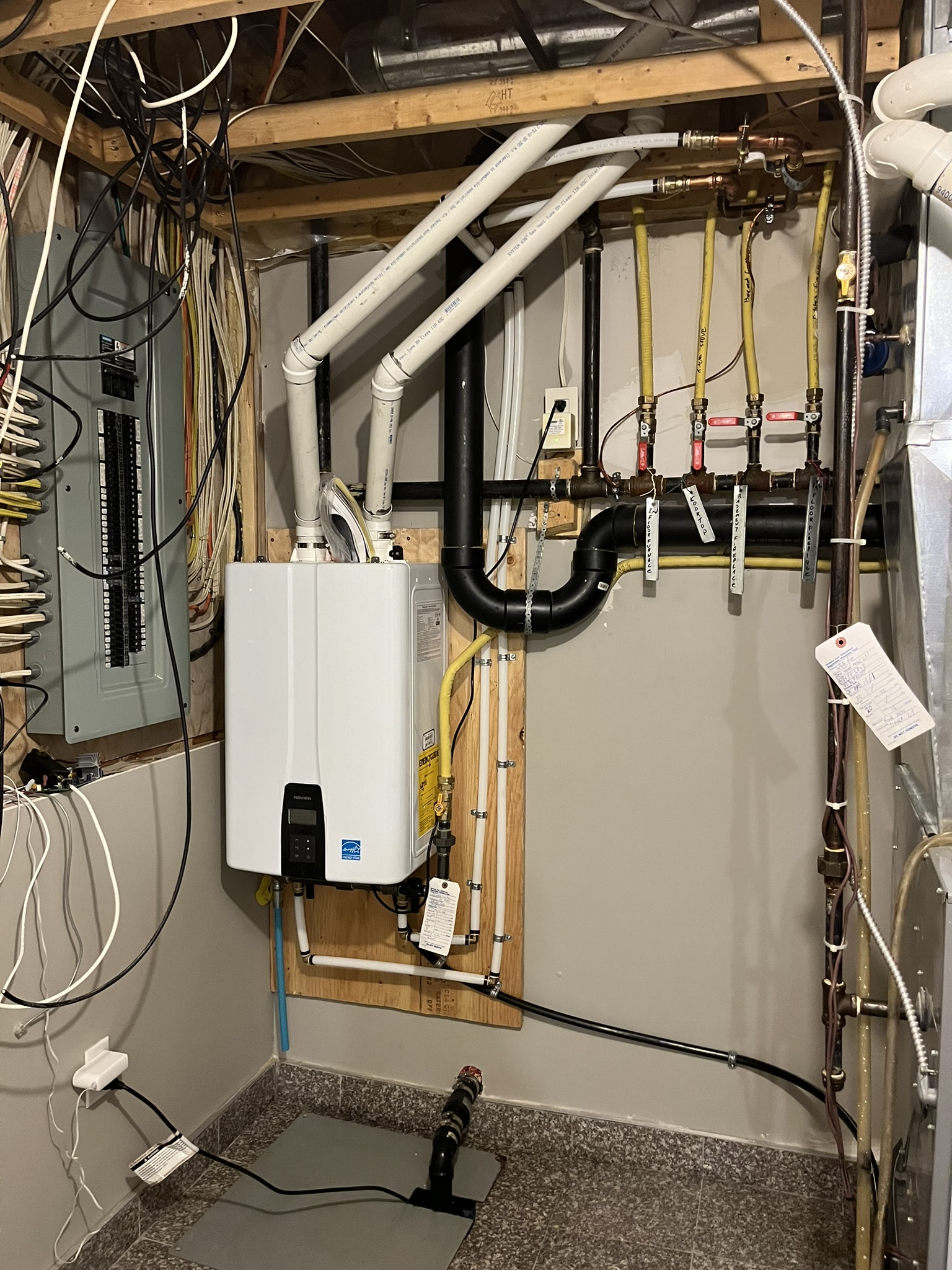 Navien tankless water heater installed in basement