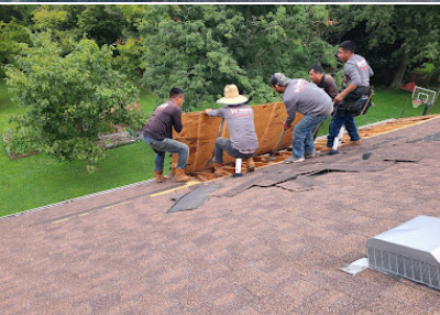 Worth Roofing Company team installing a new residential roof in Middle Tennessee