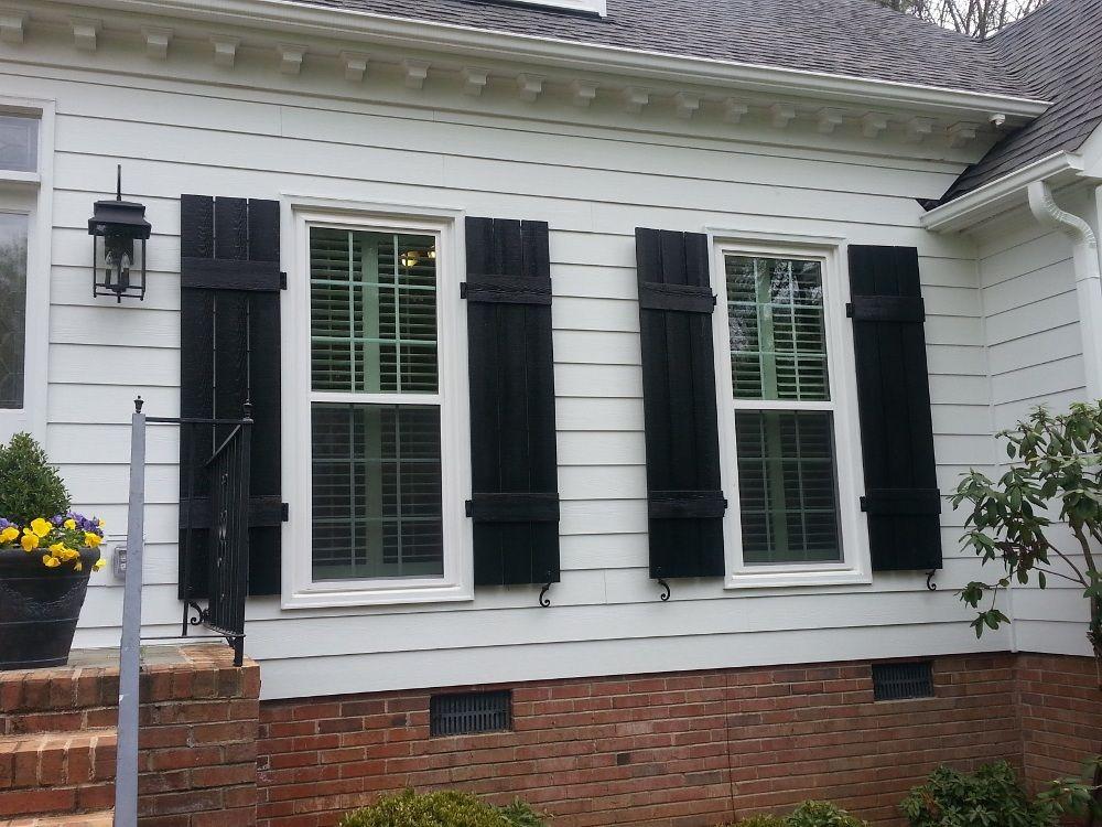 Window & Shutter Update - Crisp white windows paired with striking black shutters for a classic look.