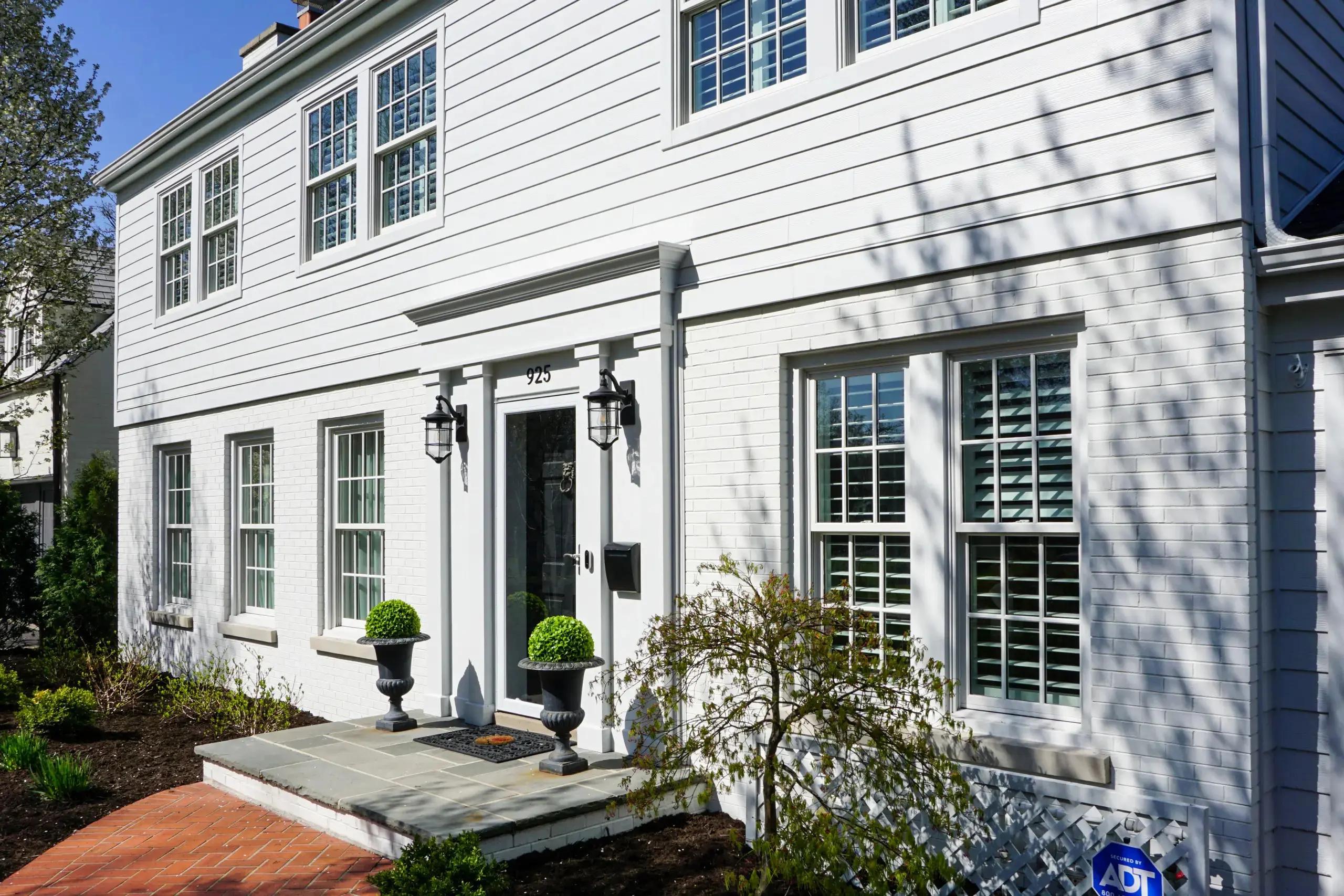 Custom Window Upgrades - Energy-efficient window upgrades that complement the classic exterior.