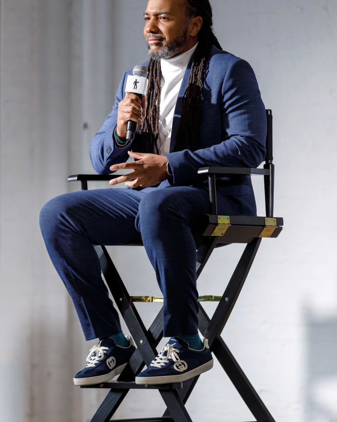 Keynote speaker on stage in director's chair