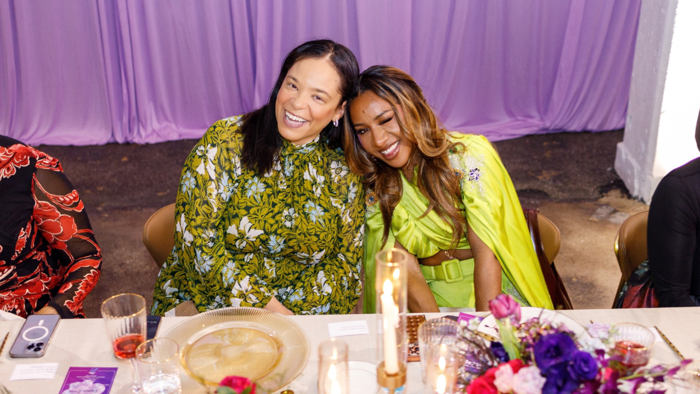 Joyful dinner celebration and gala guests sharing a moment