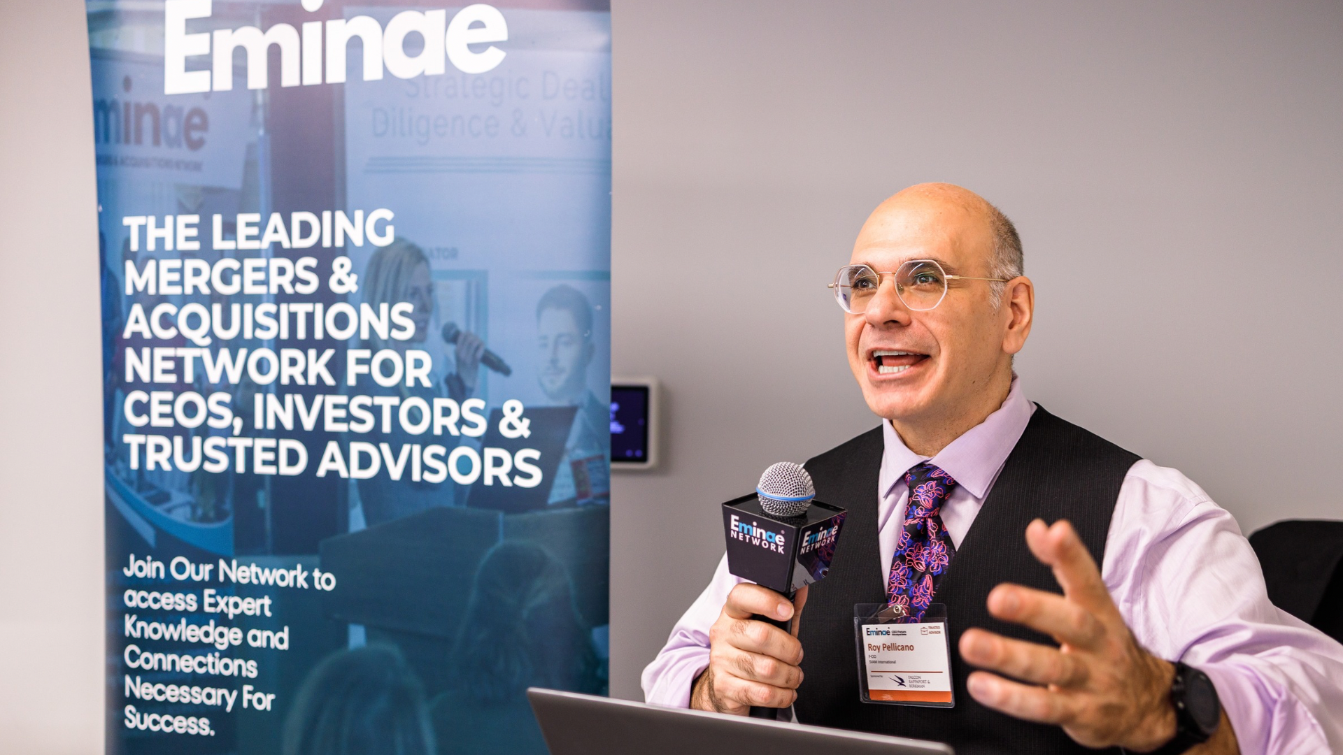 Keynote speaker sharing insights at executive investor summit