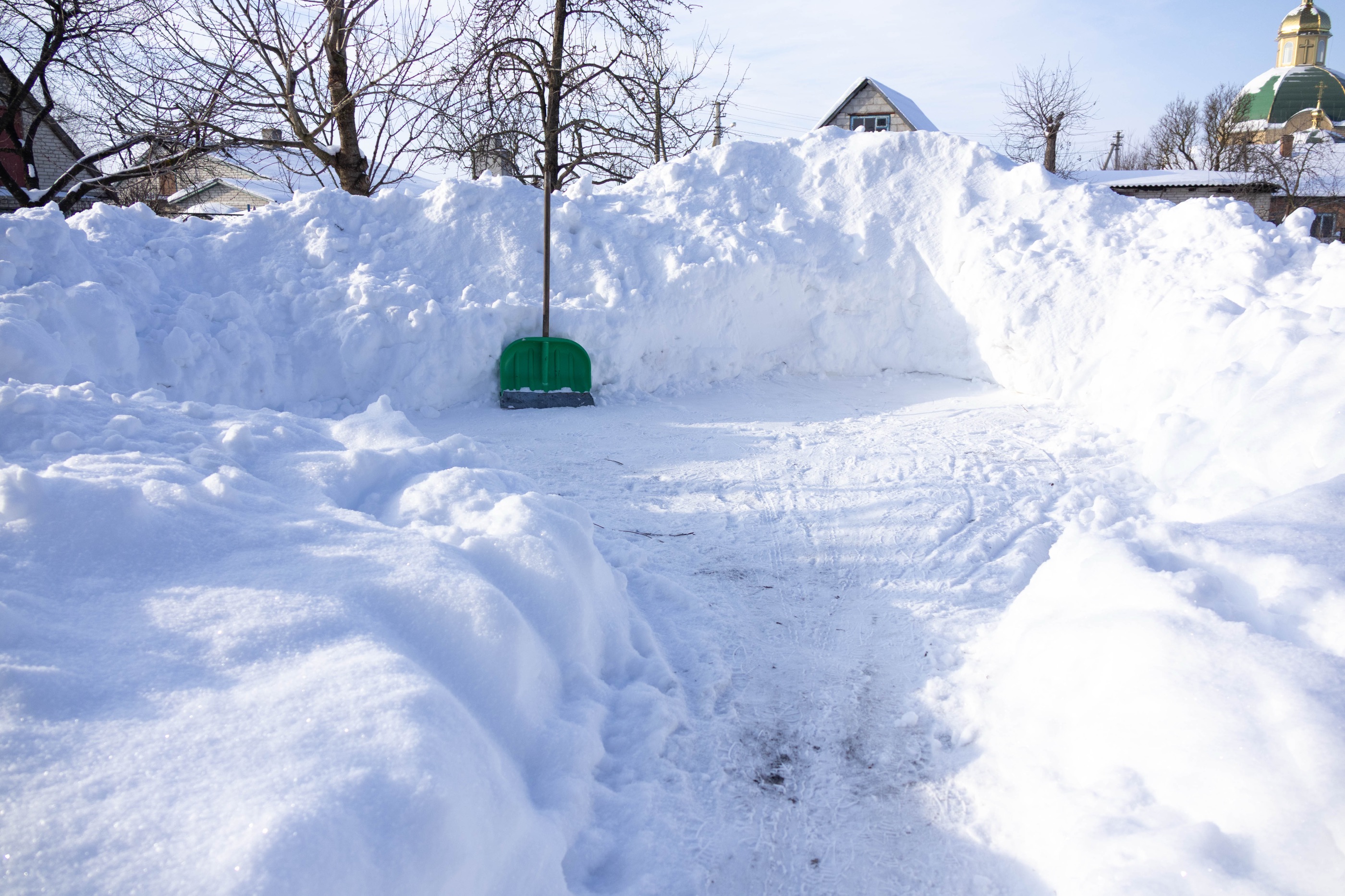 Cleared snow path with shovel