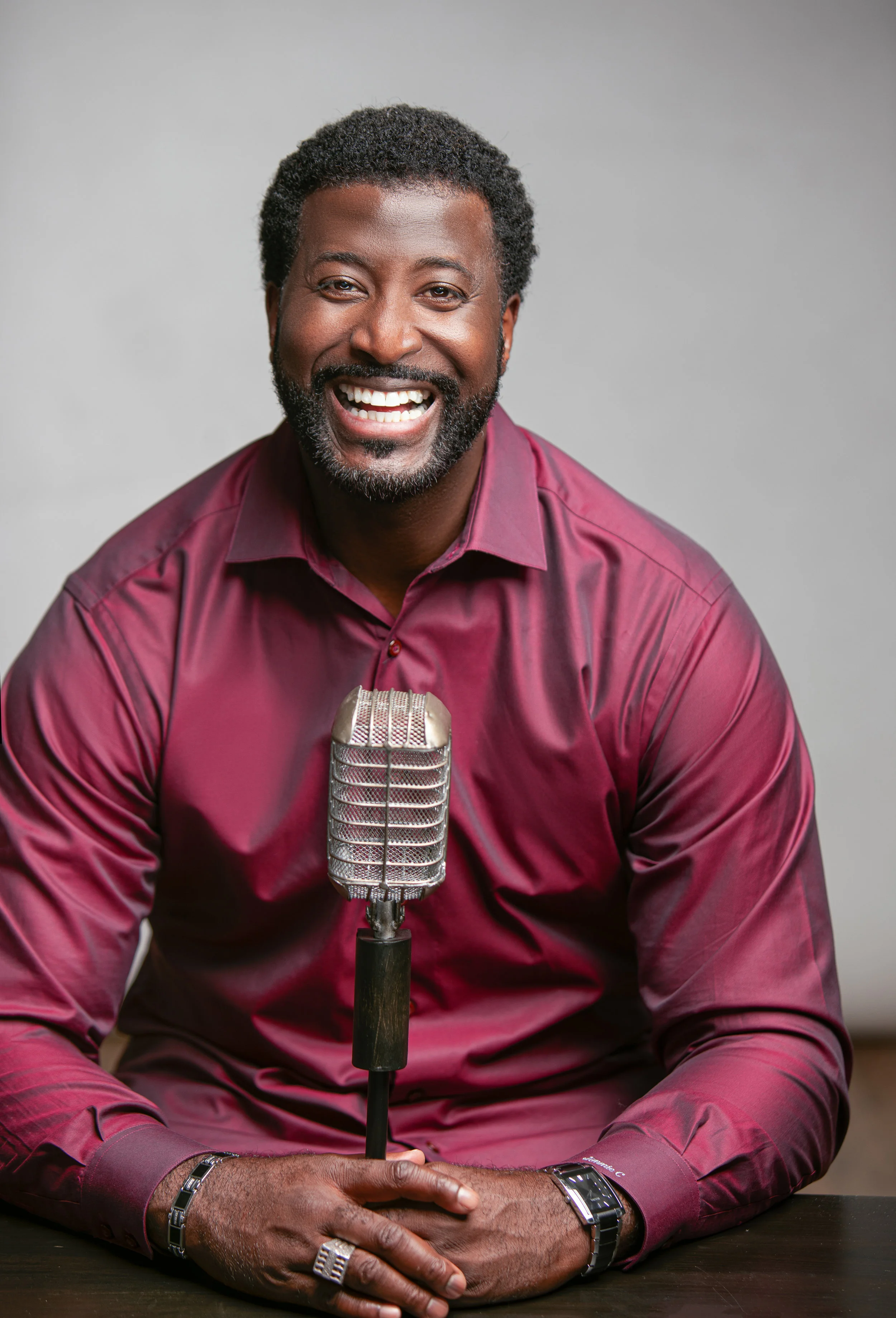 Jimmie C. Gardner speaking at microphone on stage