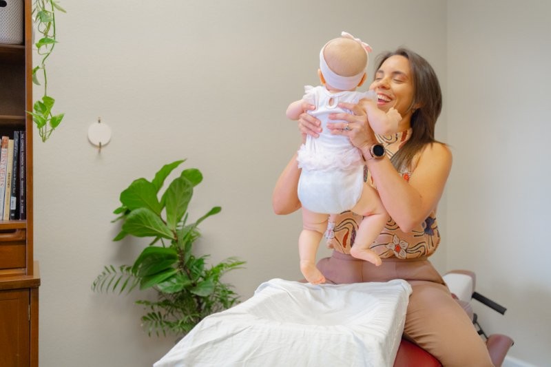 Dr. Liz holding baby