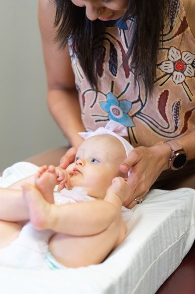 Dr. Liz providing gentle, specific infant chiropractic care at Mojica Chiropractic Care