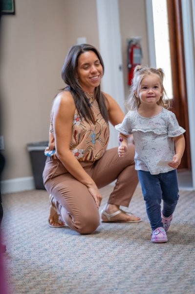 Dr. Liz with toddler at Mojica Chiropractic Care