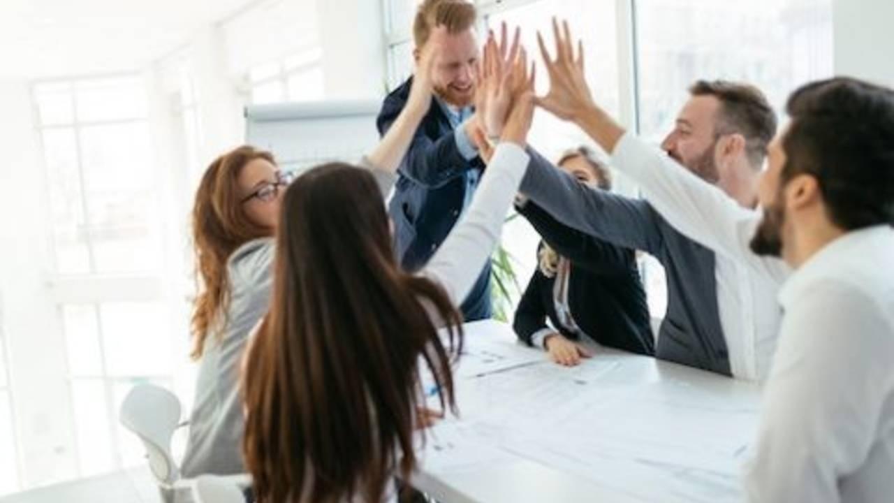 Team of professionals experiencing the benefits of quality corporate training and coaching