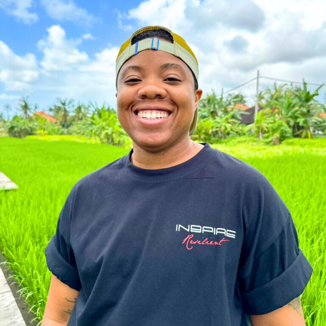 Destinē smiling outdoors