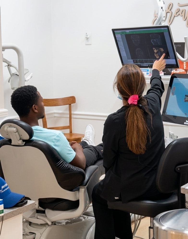 Dr. Castro reviewing scan with patient