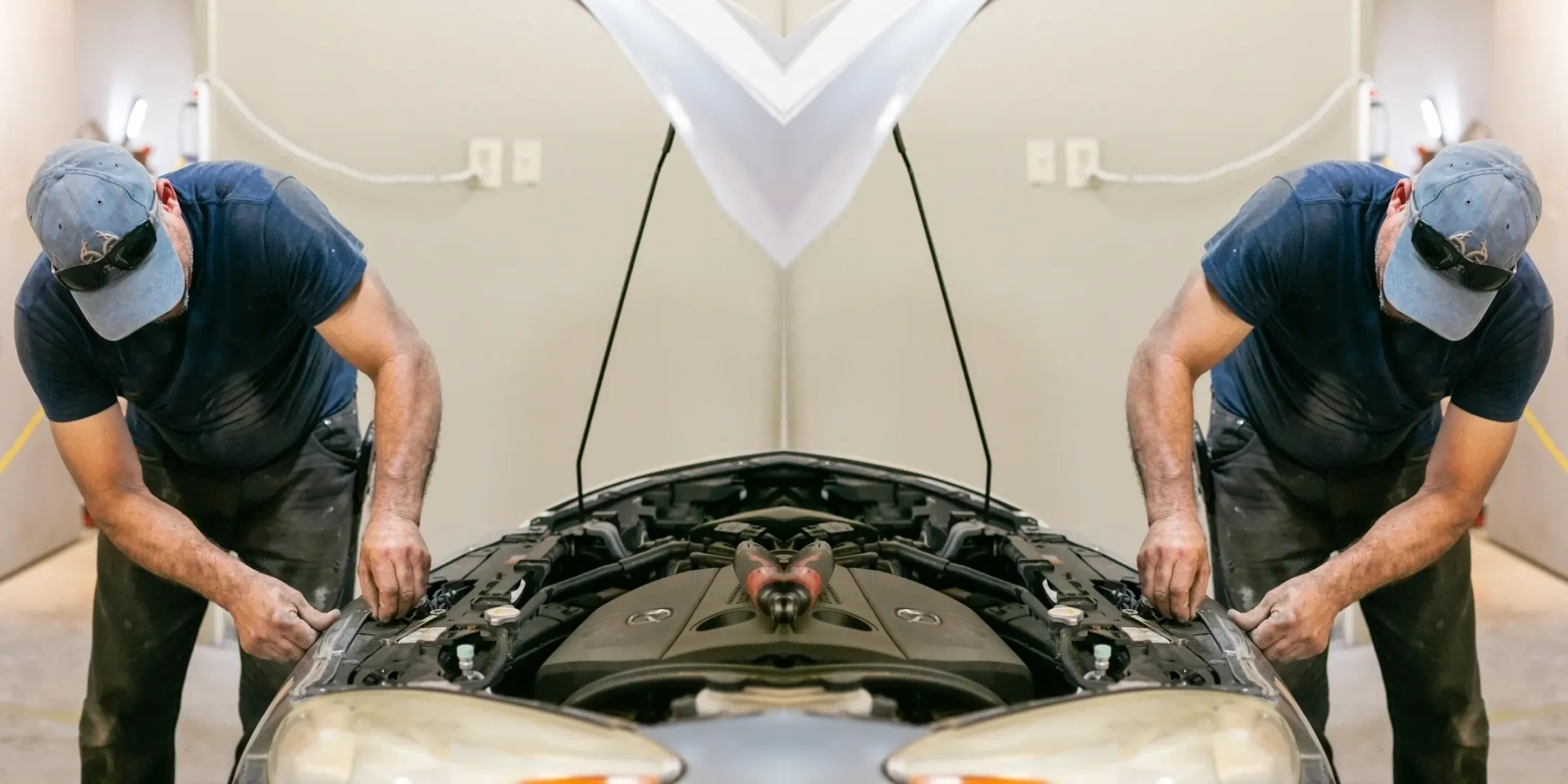 Reliable Collision mechanic working on a car