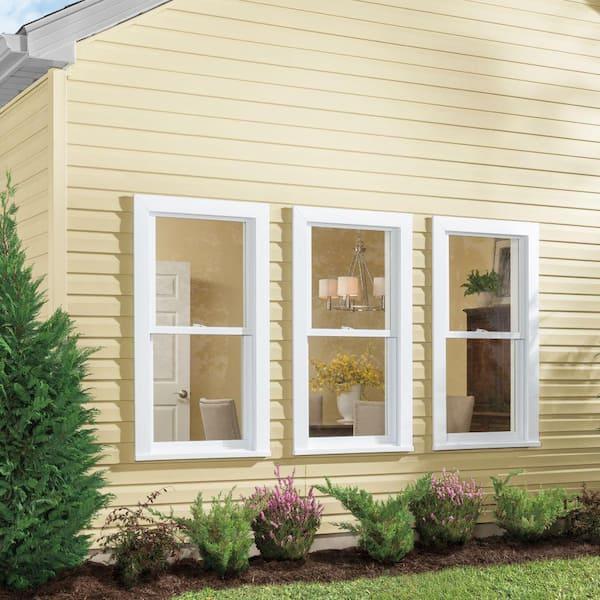 Energy-efficient replacement windows by Adkins Contracting
