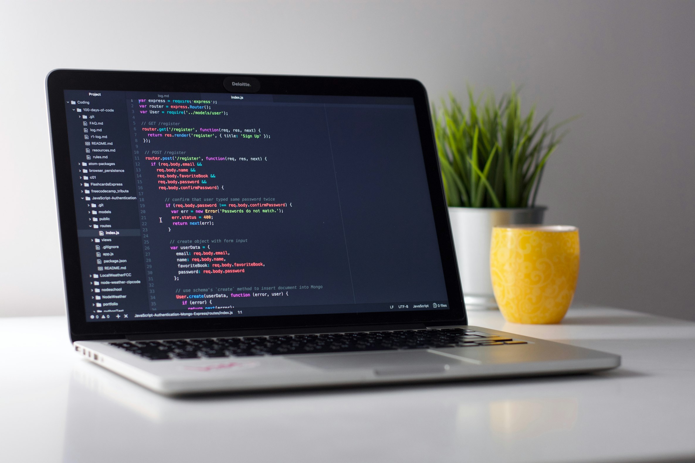 Modern minimalist website design displayed on laptop screen
