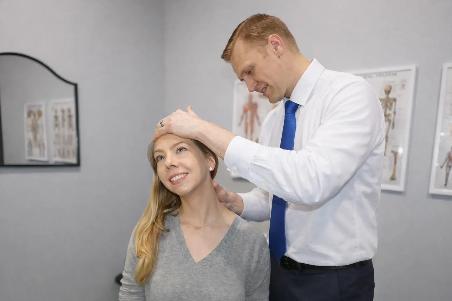 Dr. Erik Carlson performing a chiropractic adjustment