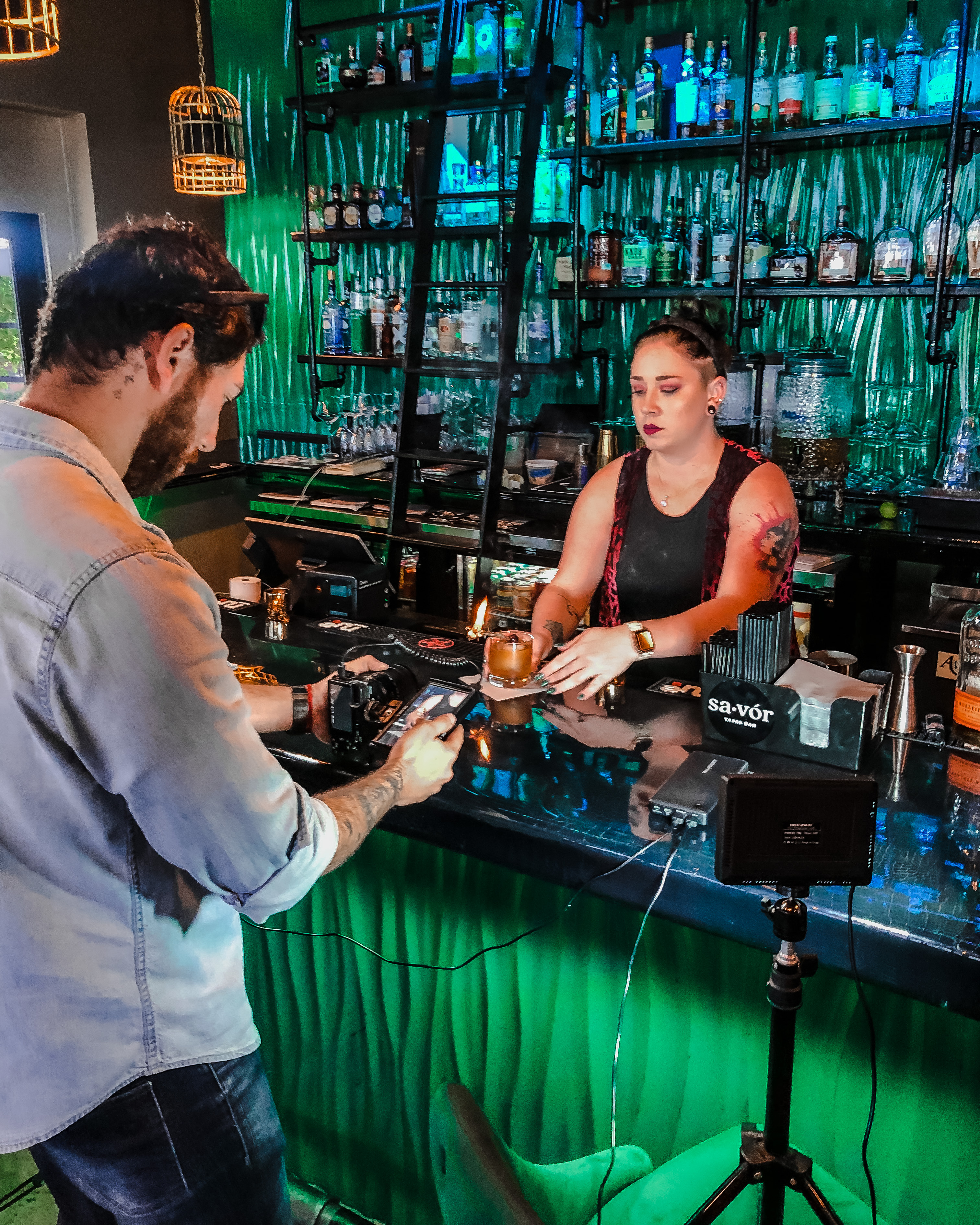 Jose filming at a local business