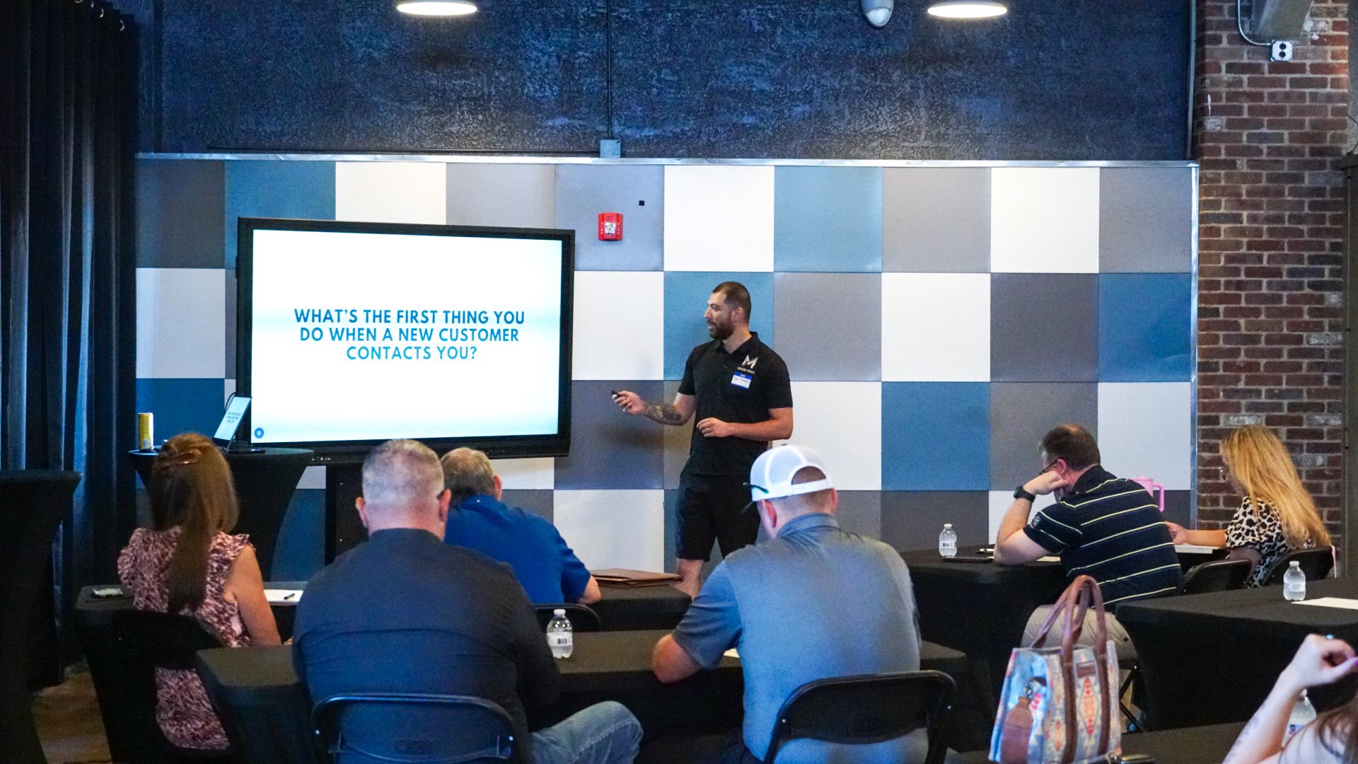 Jose teaching a digital marketing workshop to local business owners
