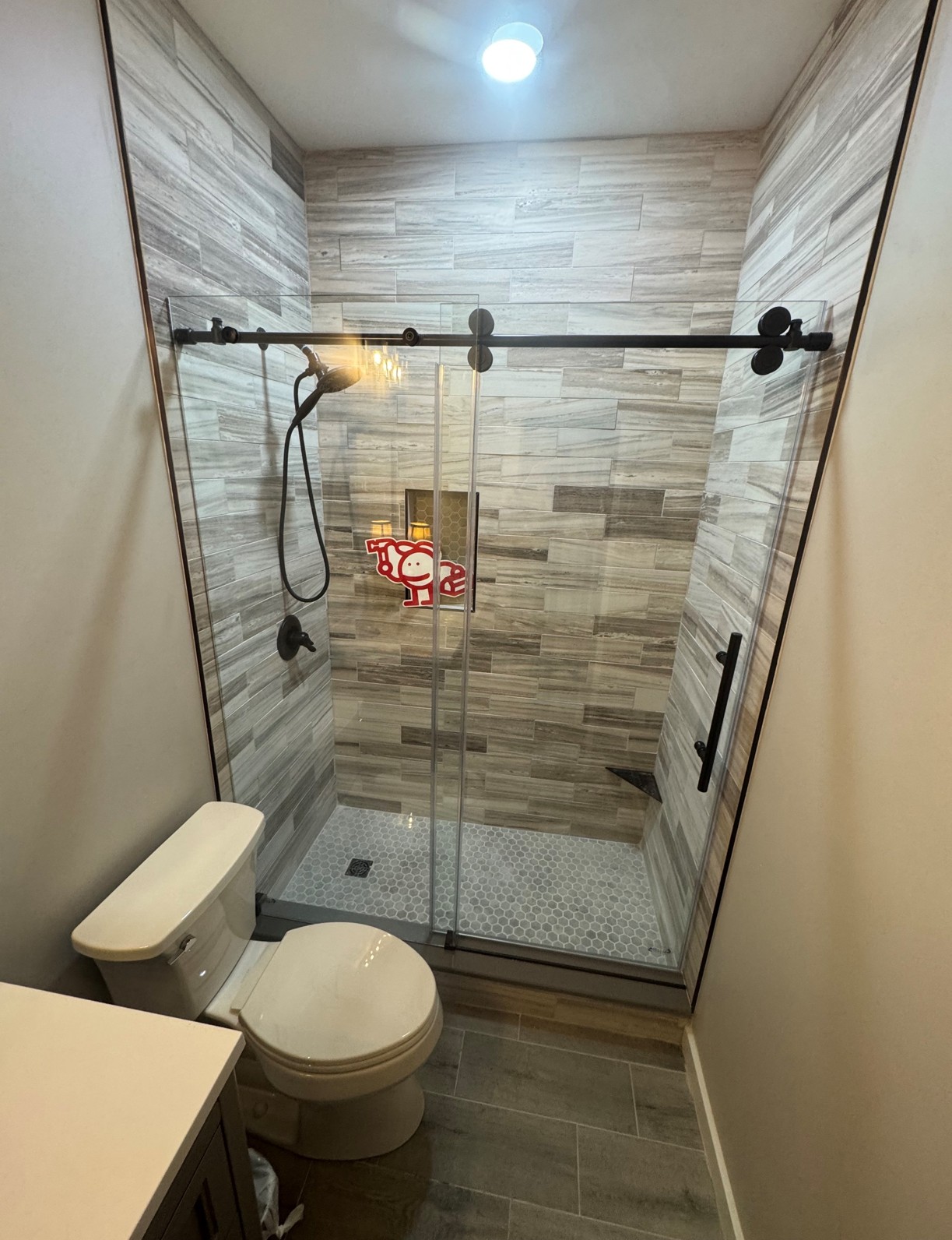 modern tile walk-in shower with sliding glass door Adairsville Georgia — Marshall's Handyman Service