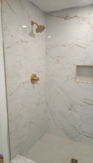 custom marble shower with brass fixtures Cartersville Georgia — Marshall's Handyman Service