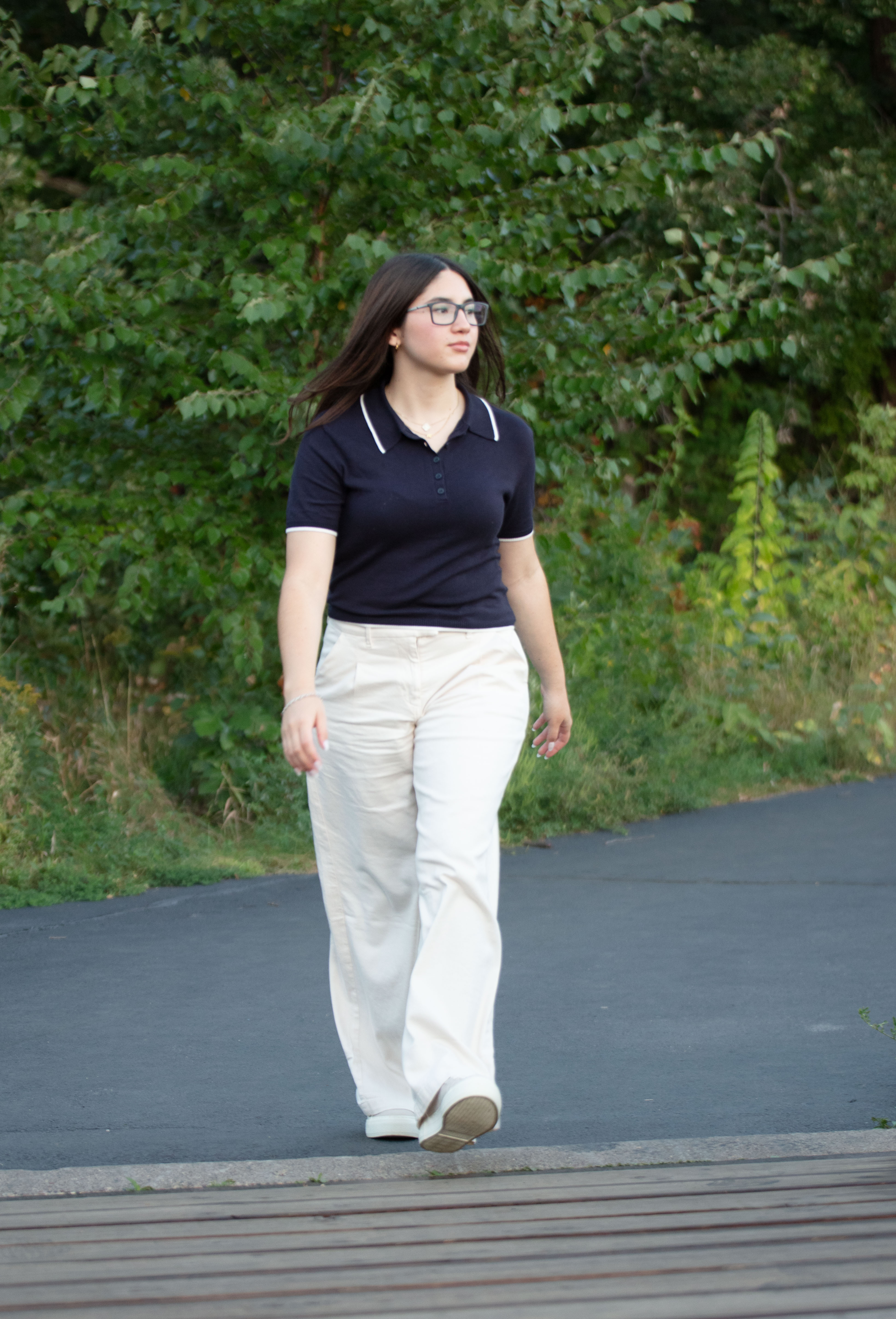Senior girl walking outside