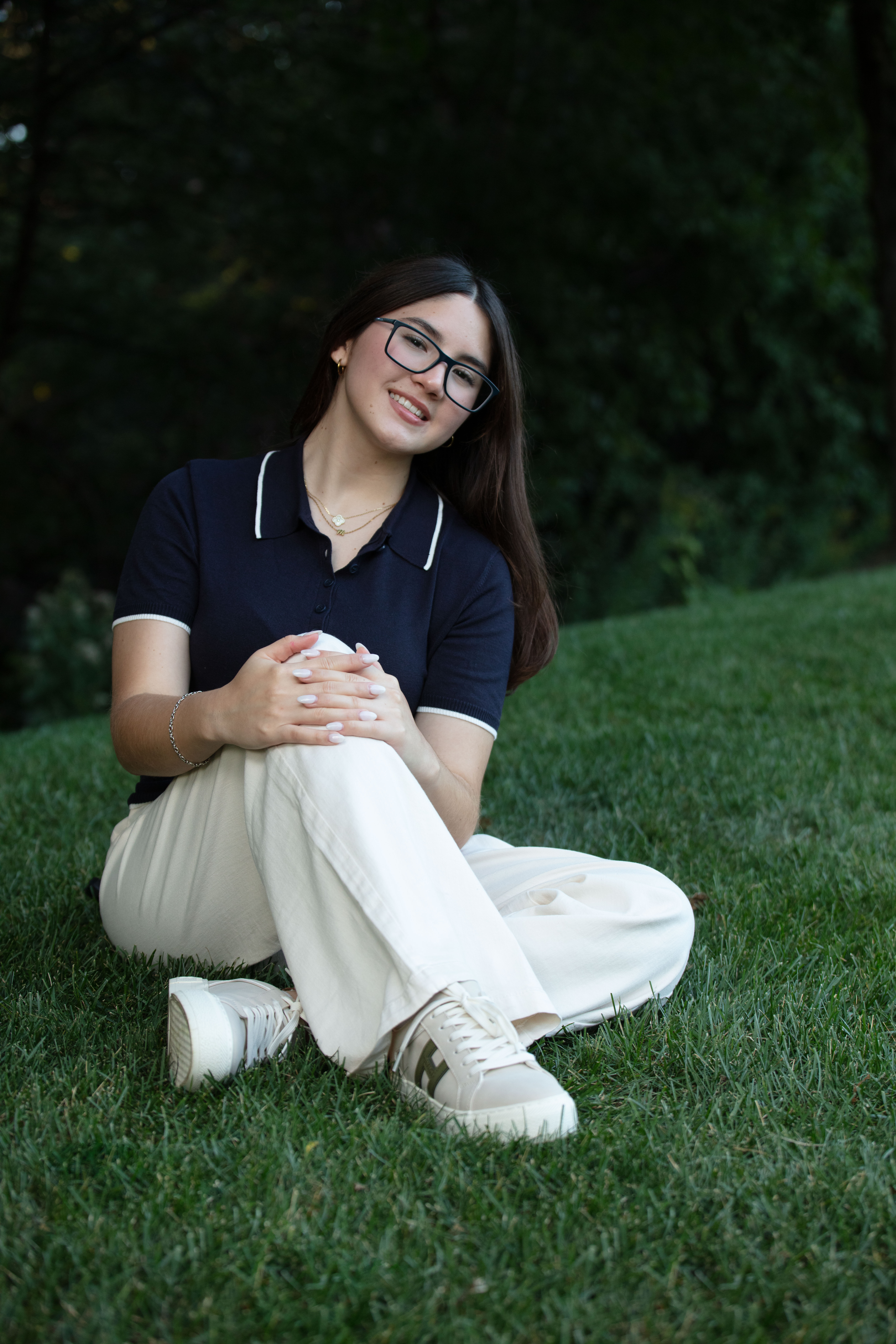 Senior girl sitting on grass