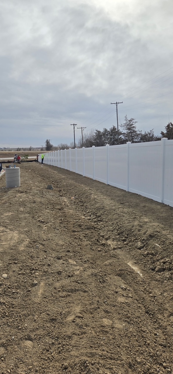 Long Vinyl Fence Installation