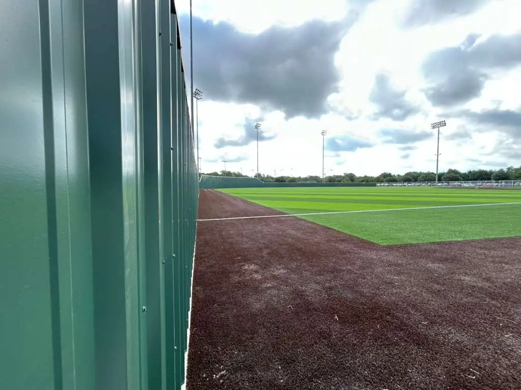 Commercial fencing project Texas DFW - sports enclosure installation
