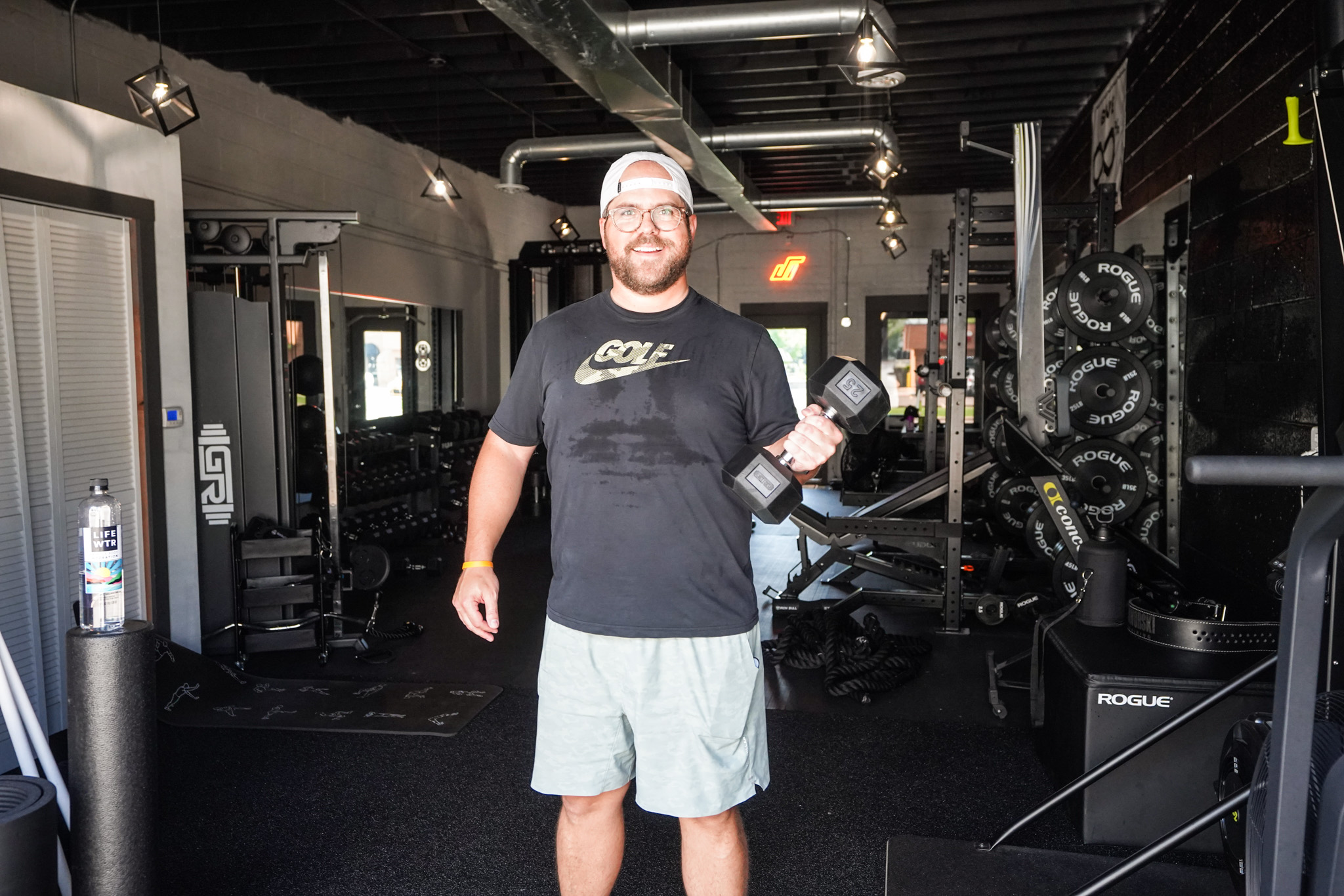 Client with dumbbell