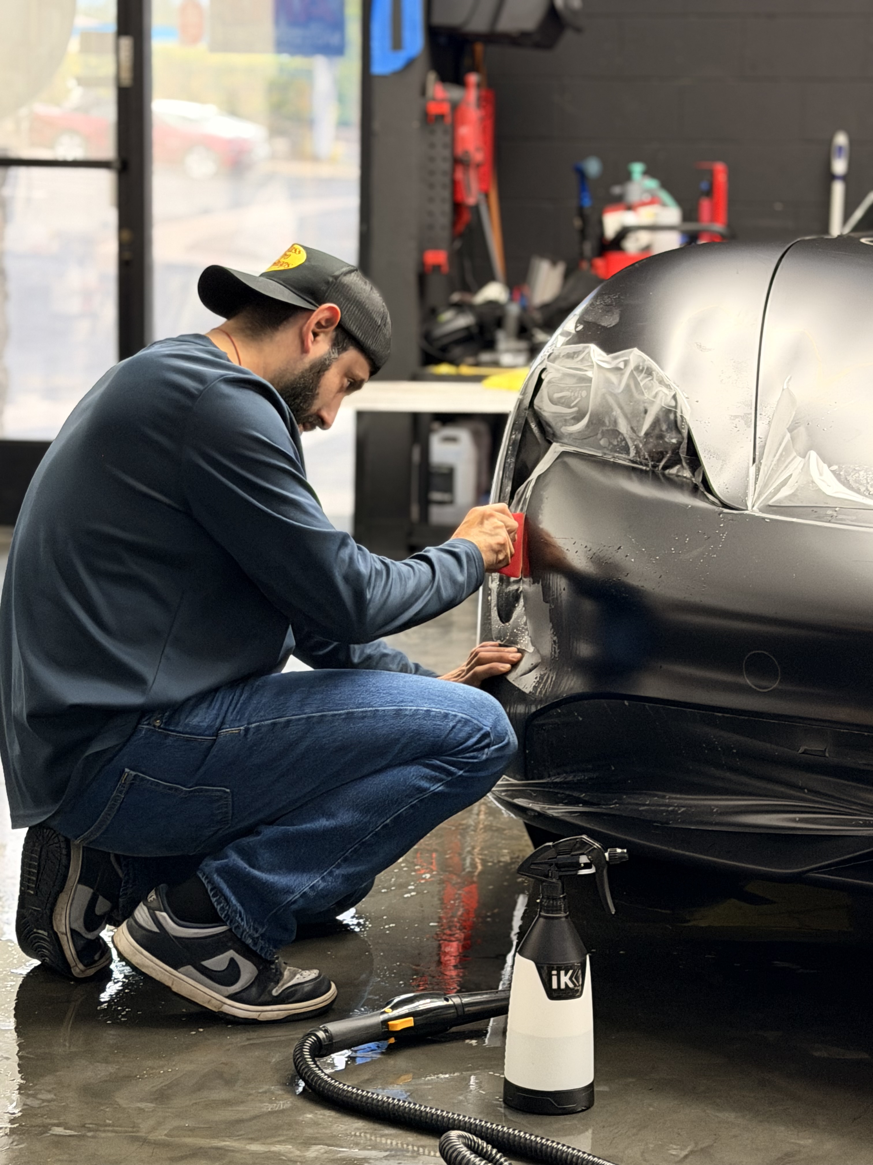 Professional PPF installation on vehicle bumper in Riverside CA