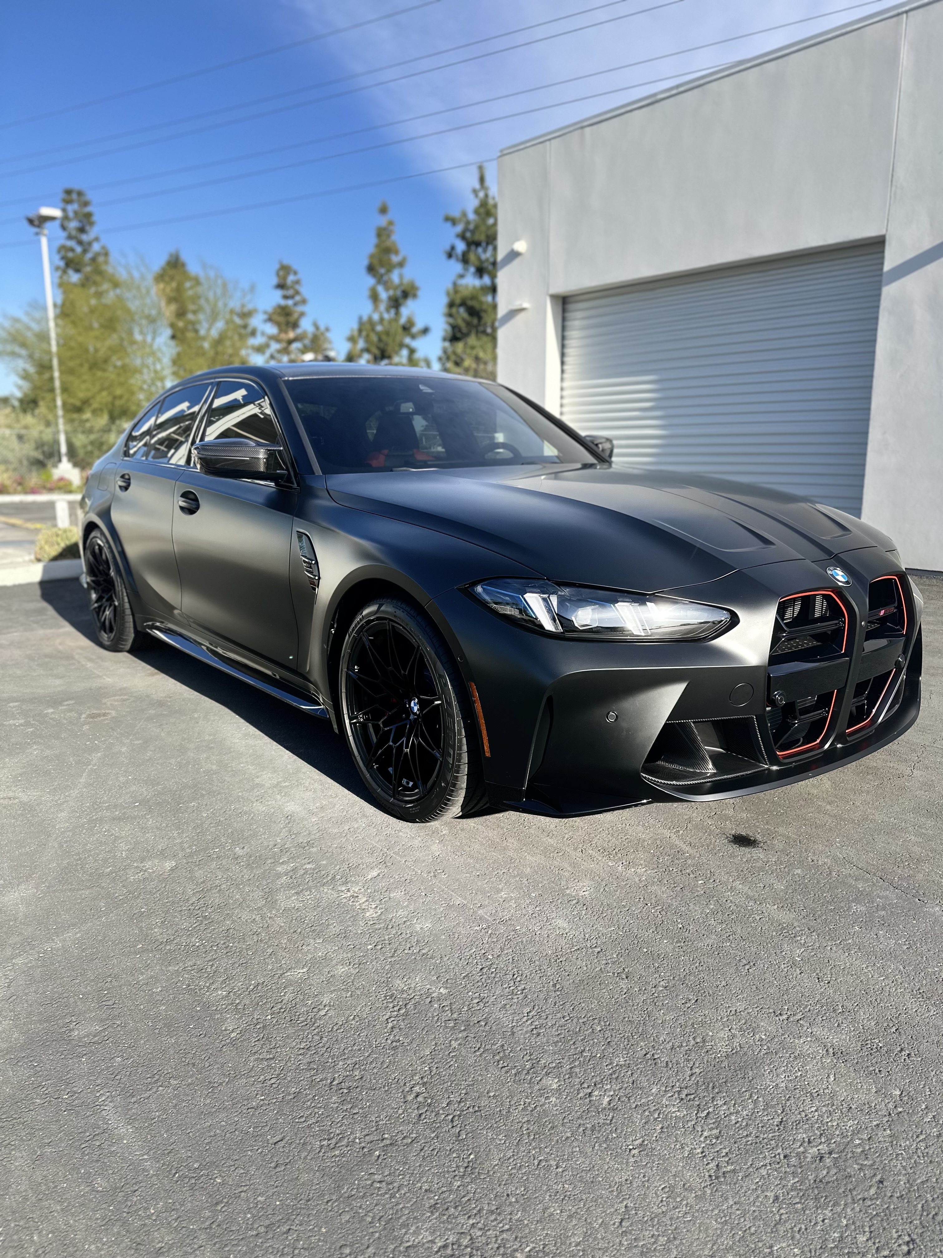 Matte Black BMW M3 Front Profile Riverside