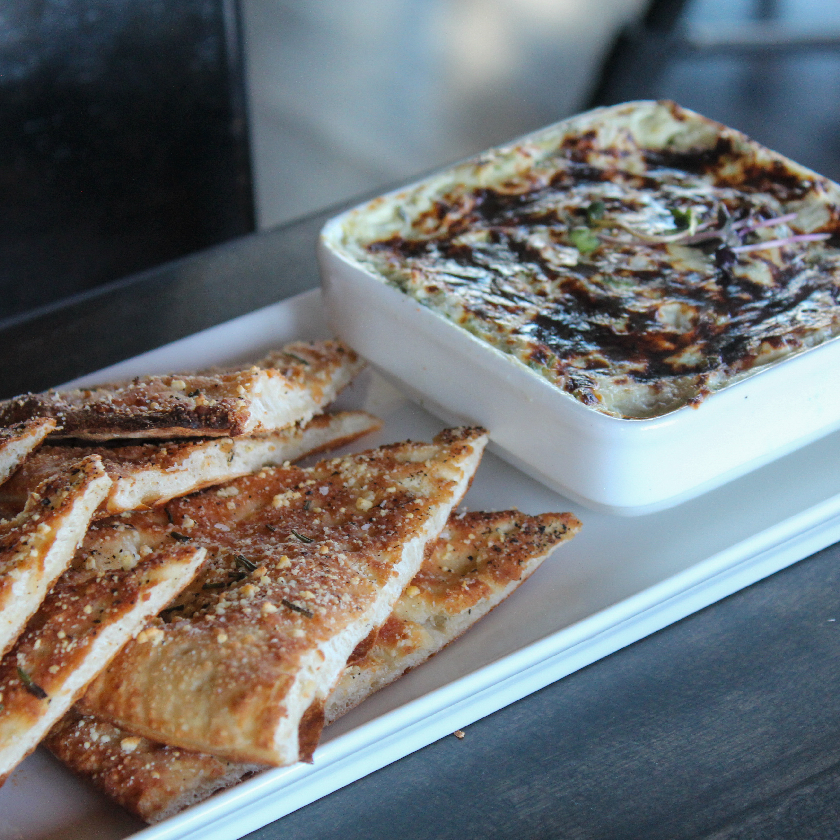 Baked Spinach & Artichoke Dip with homemade parmesan flatbread