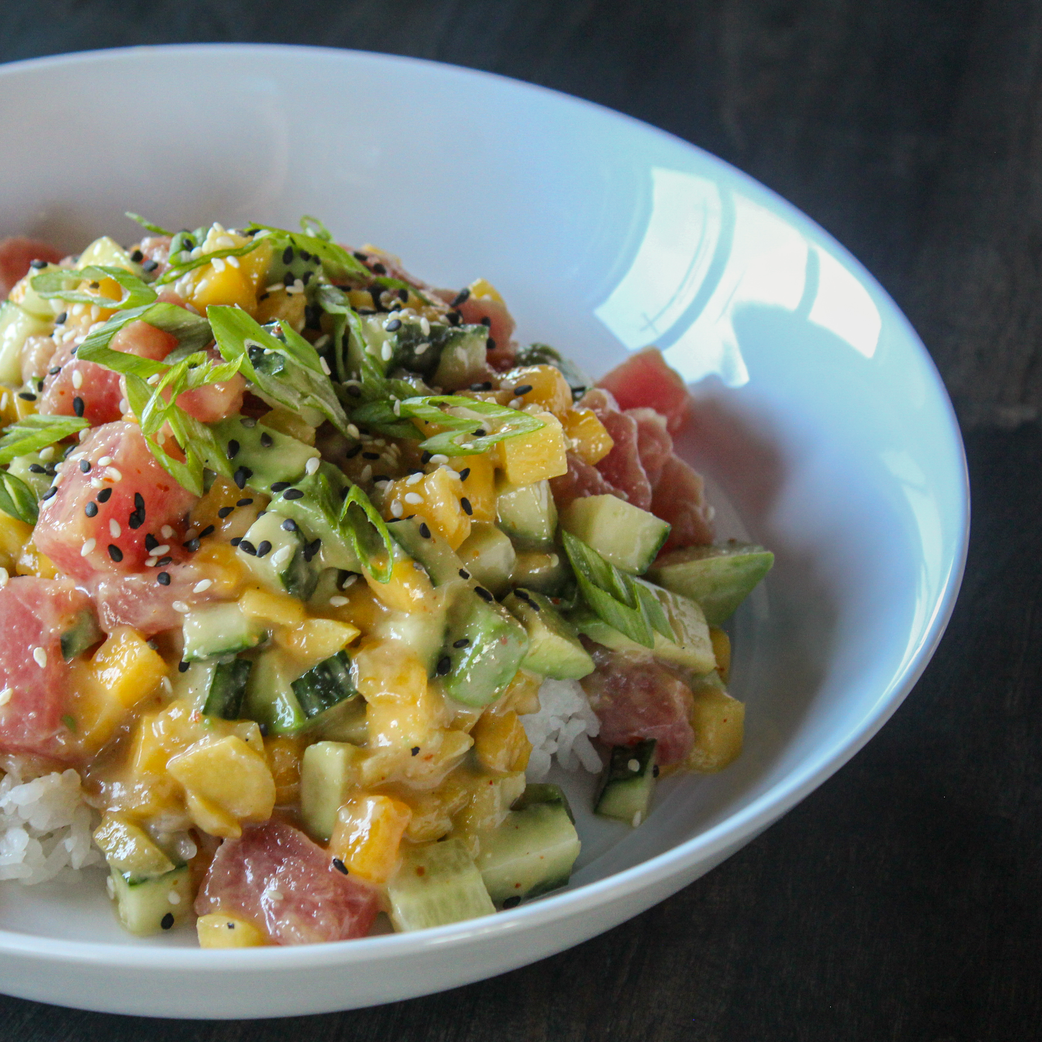 Ahi Poke Bowl with fresh mango, avocado, and sesame
