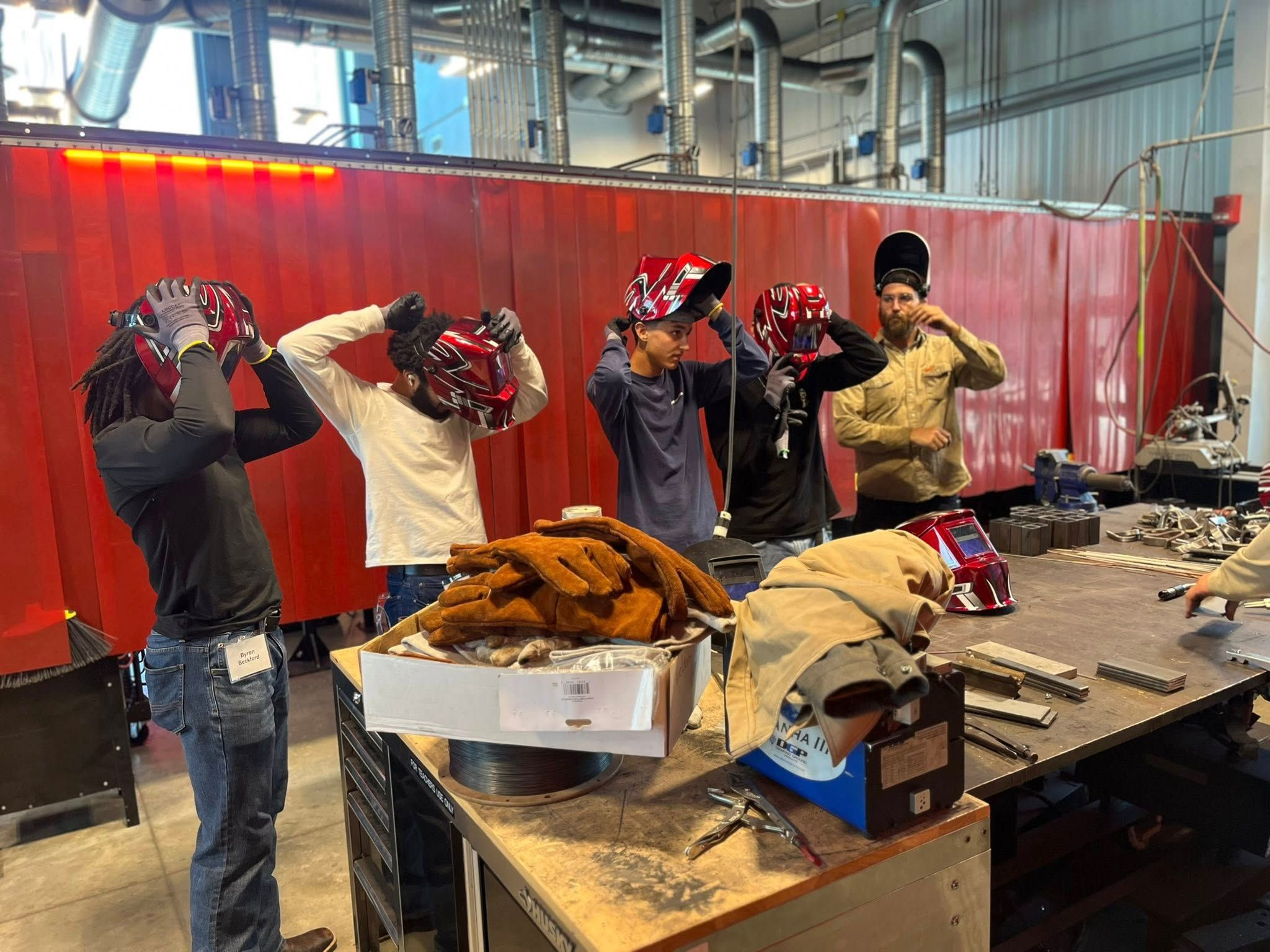 Students learning welding