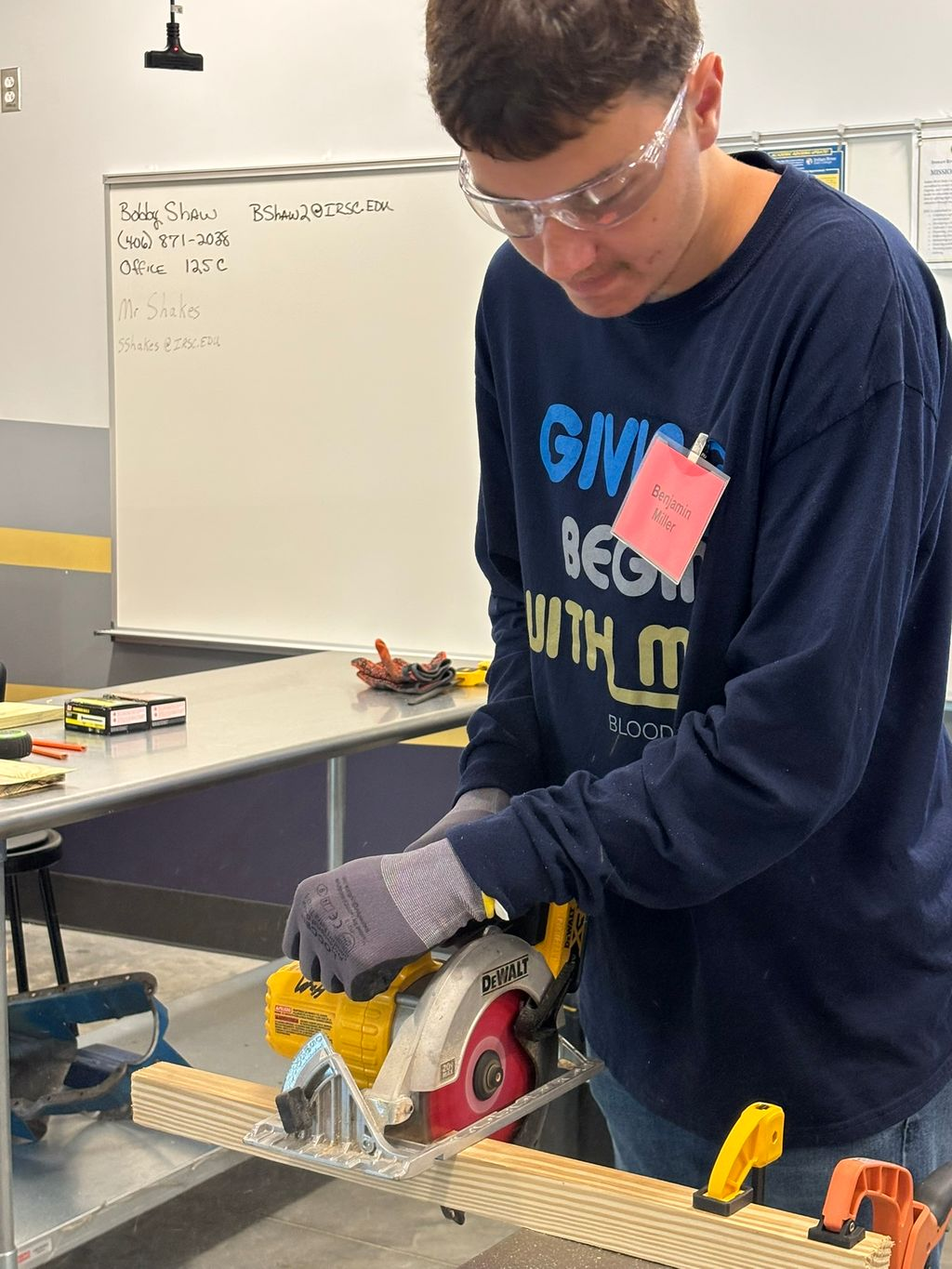 Student using a circular saw