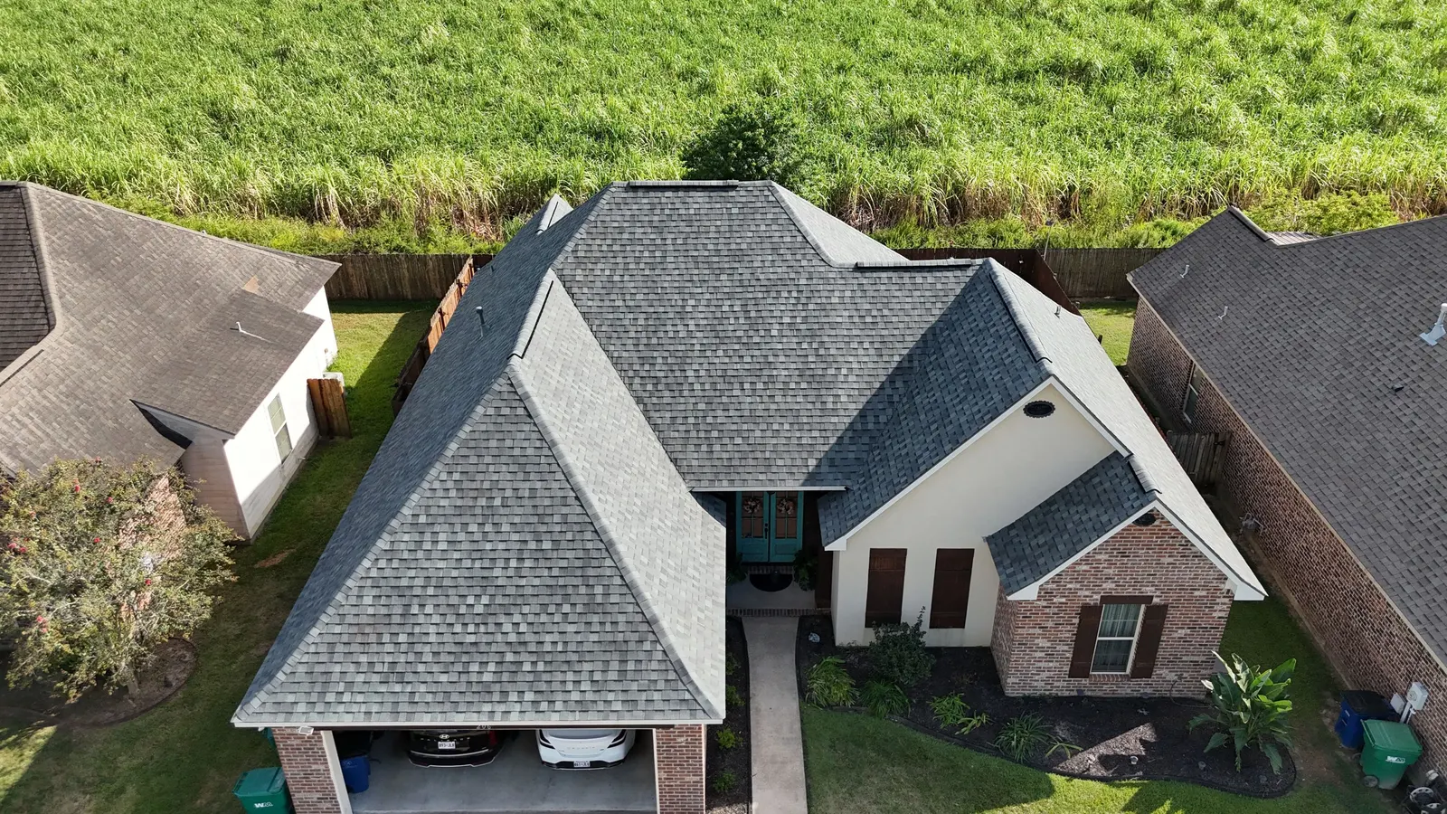 Completed architectural asphalt shingle roof replacement by Shingle Solutions in Lafayette LA