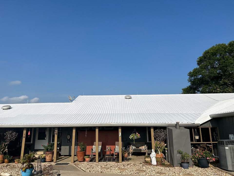 Premium white metal roofing on Acadiana home