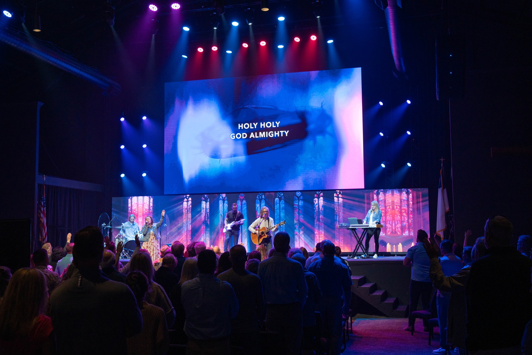 The Island Church congregation worshipping together during a Sunday service