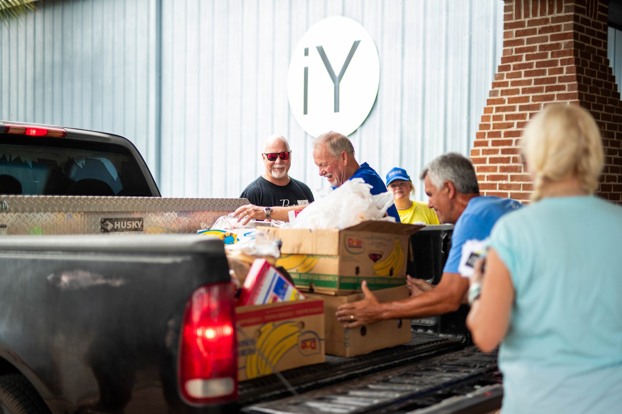 Volunteers distributing food at the Island Mobile Food Pantry