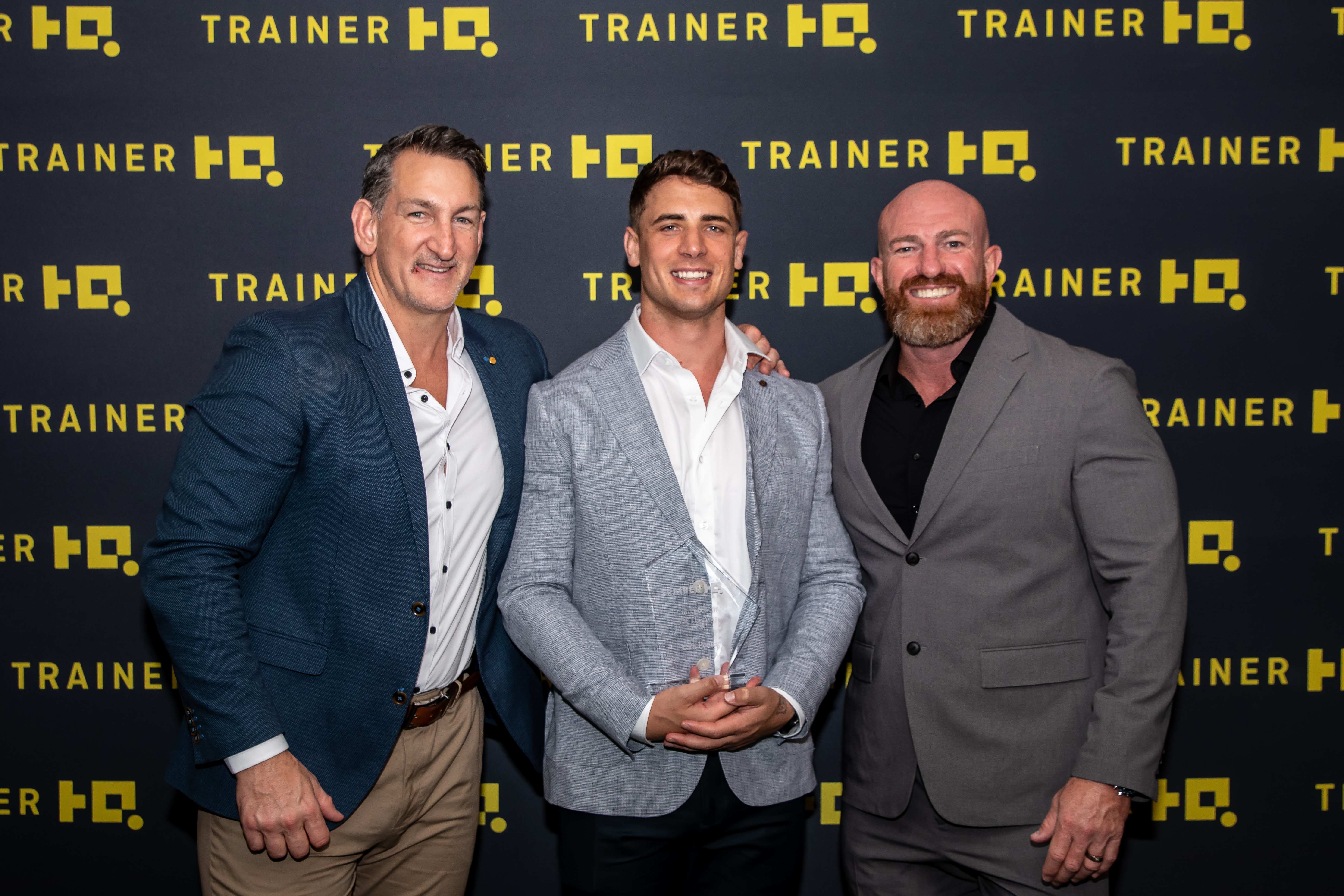 Ezra Pooley receiving THQ AUS/NZ Entrepreneur of the Year award