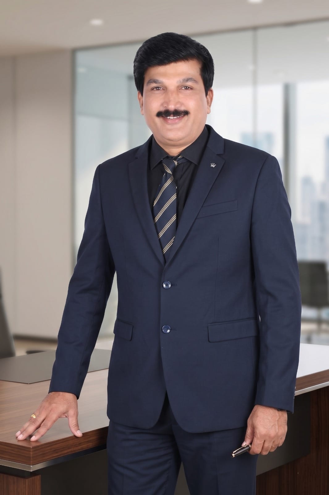 Dr. Dinesh Mungath