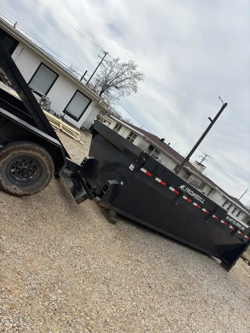 Ironbull roll-off dumpster dropped off at a residential property