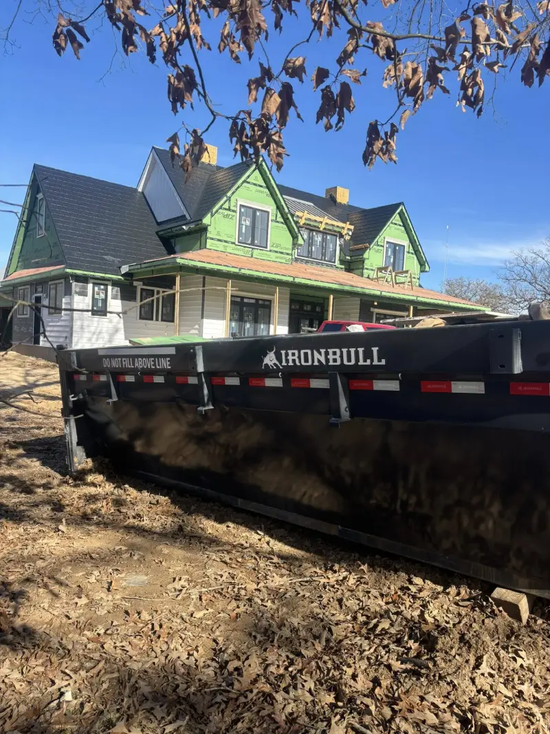 Roll-off dumpster at residential construction site