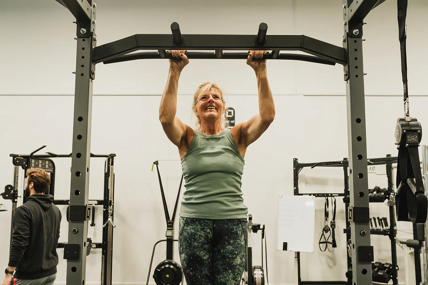 Fit woman doing a pull-up