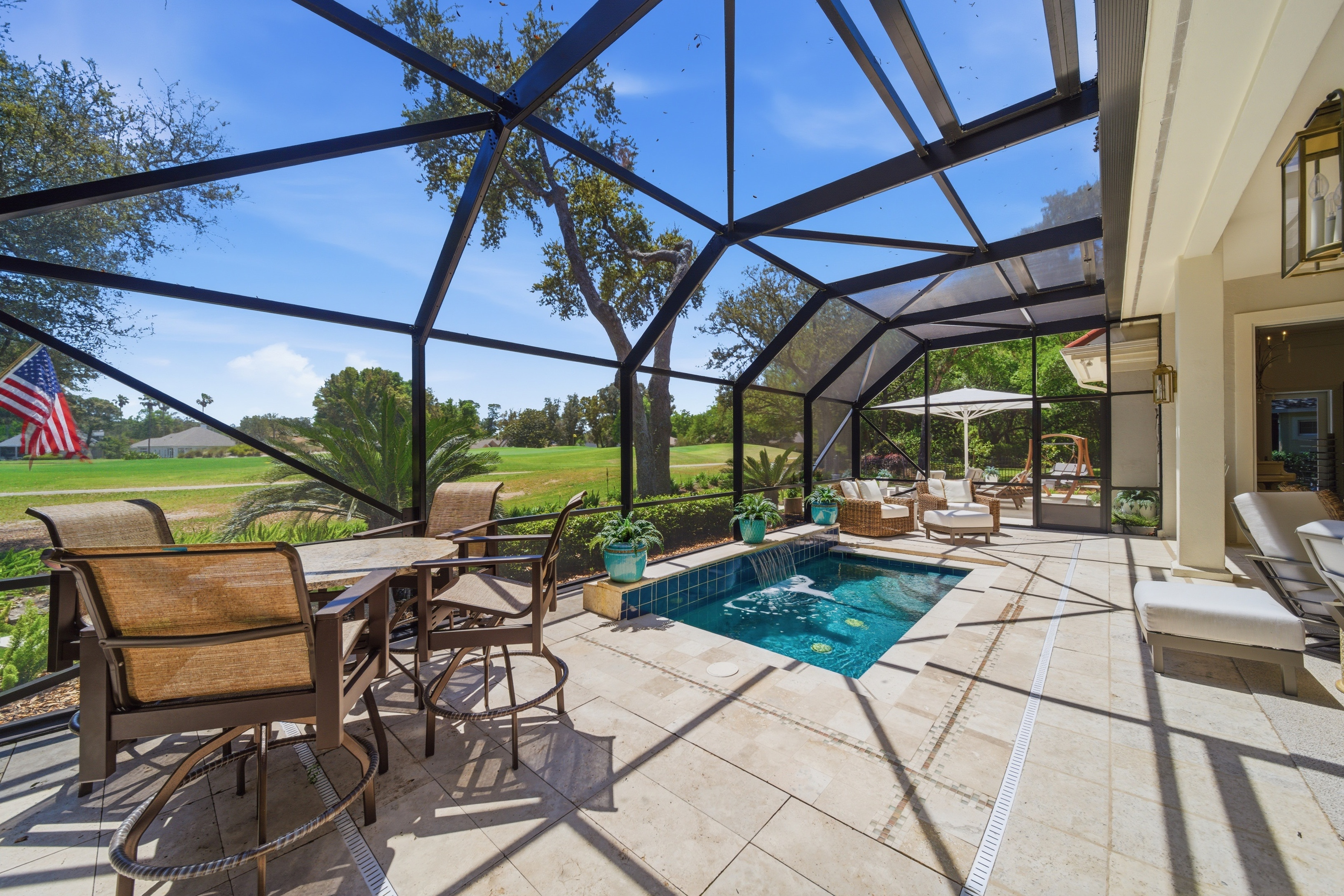 Heated pool within screened lanai